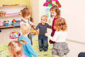 Group of little children dancing