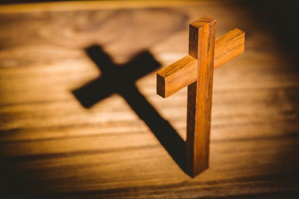 Crucifix icon on wooden table